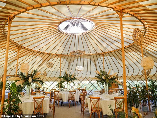 The couple hired a 50-foot yurt with a fairy-lit ceiling and a 'large floral display' for their guests to dine in, plus a large marquee for drinks and dancing afterwards. Pictured is one of the large wedding venue yurts supplied by Yorkshire Yurts Ltd