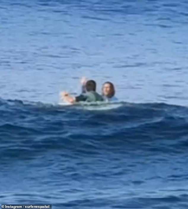 Footage shared to social media shows the as-yet-unidentified surfer punching a Venezuelan man as they were both in the water