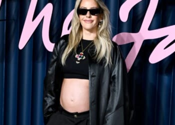 Ellie Goulding, 38, reveals she’s pregnant with boyfriend Beau Minniear, 28 as she shows off her bump at Fashion Awards