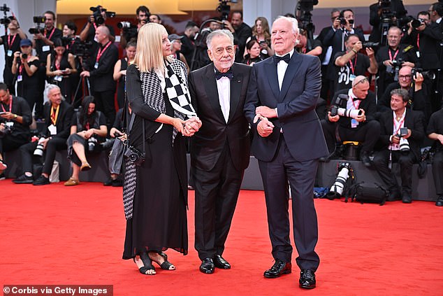 The financial fallout from his latest film, meanwhile, is still being felt, after poured $120 million of his own finances into it to make it a reality. Pictured, the Oscar-winning filmmaker flanked by Lena and Werner Herzog at the premier of a different film last August