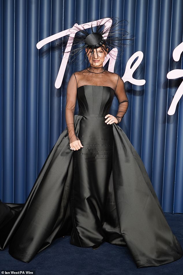 TV personality Sam Faiers, 34, turned heads in a dramatic look which featured a quirky headpiece with huge feathers