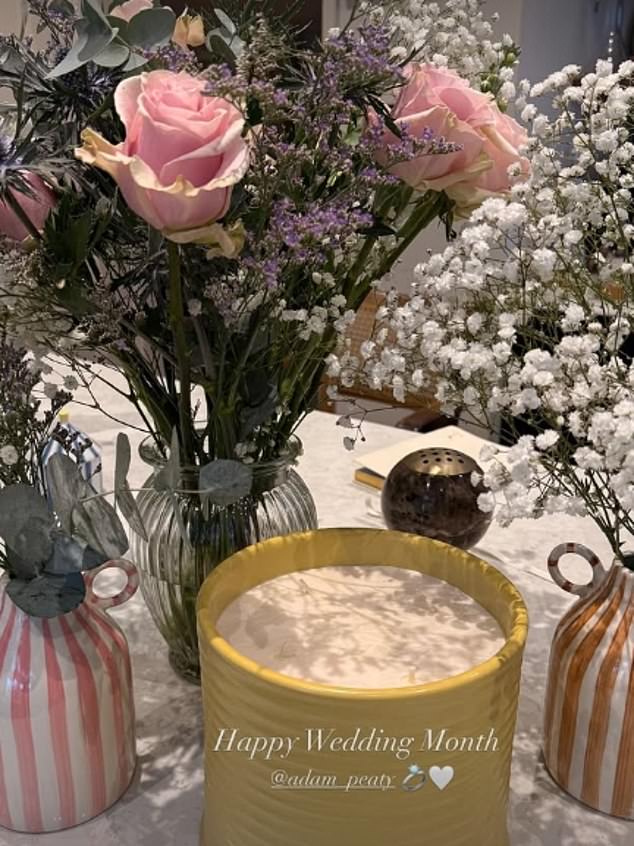 Holly wished her husband-to-be a 'happy wedding month' in a sweet Instagram post on Monday, after being sent a 'pretty' surprise from him