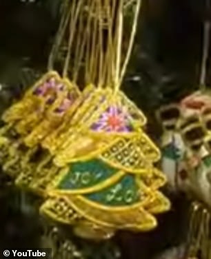 A fabric Christmas tree bauble (pictured) costs £14 at one of the stalls at Manchester Christmas market - despite a version of the festive decoration being available on H&M for £7.99