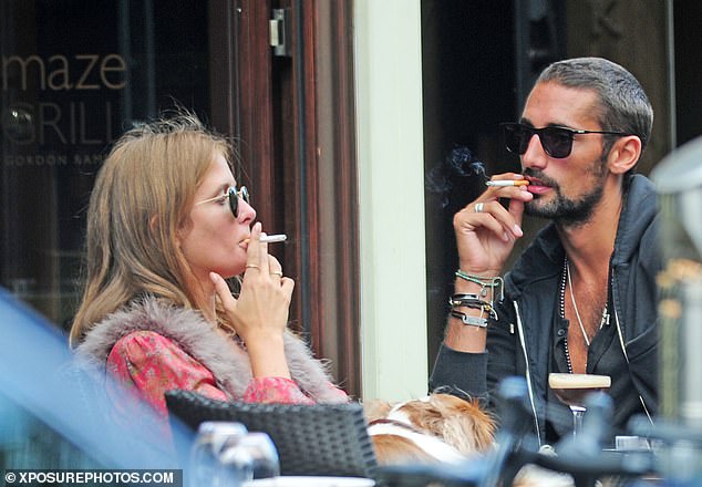 Millie and her now husband Hugo Taylo during Made In Chelsea. 'I didn¿t think I was an alcoholic, but I was certainly a destructive drinker,' she writes