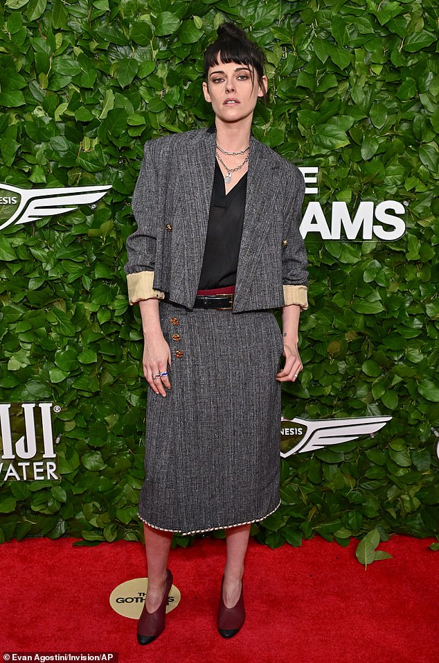 Kristen Stewart, 35, walked the red carpet in a cropped blazer with a matching tweed skirt, both a bit oversize for a added casual detail to her business outfit