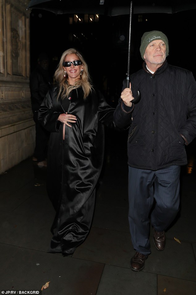 The insider added: 'It's really lovely to watch, she's very happy'