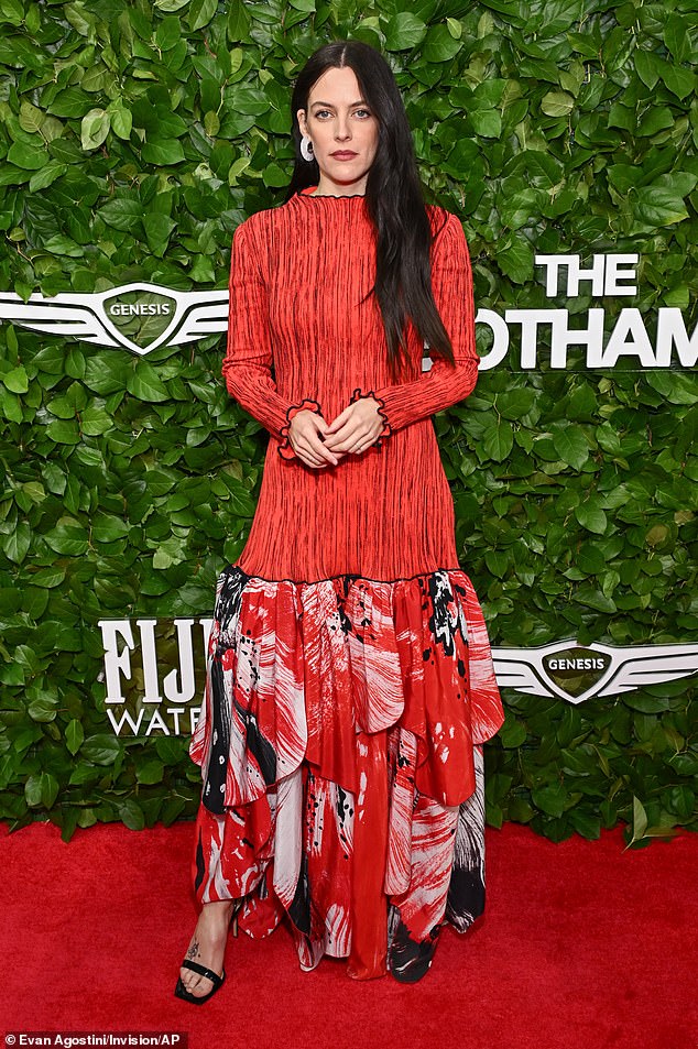 Riley Keough, 36, wowed the crowd in a vibrant red frock with a drop waist and a ruffled skirt
