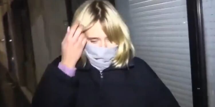 Moment Putin's 'secret daughter' confronted on the street by angry Ukrainian & told 'your dad killed my brother'