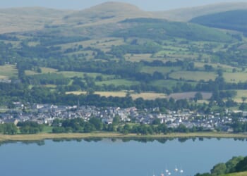 Tiny lakeside town that looks more like Canada is home to Victorian manor hotel and huge mountains