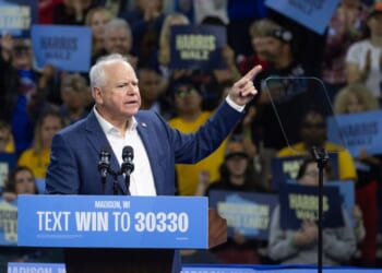 Minnesota Gov. Tim Walz speaks at a get-out-the-vote rally on Oct. 22, 2024, in Madison, Wisconsin.