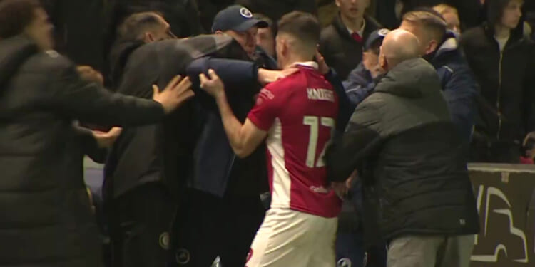 Shocking moment mass touchline brawl erupts in Championship clash as manager reveals 'crazy' reason for bust-up