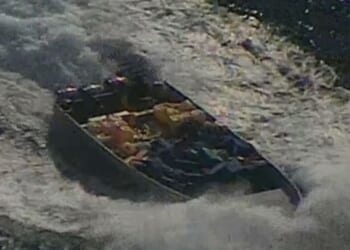 Moment US sniper opens fire on narco boat before seizing massive haul of cocaine