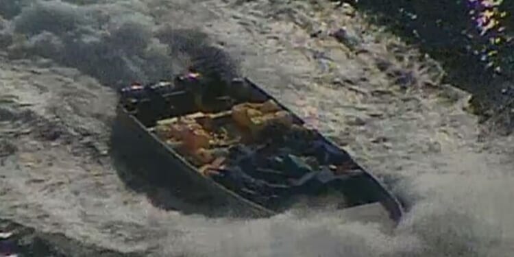 Moment US sniper opens fire on narco boat before seizing massive haul of cocaine