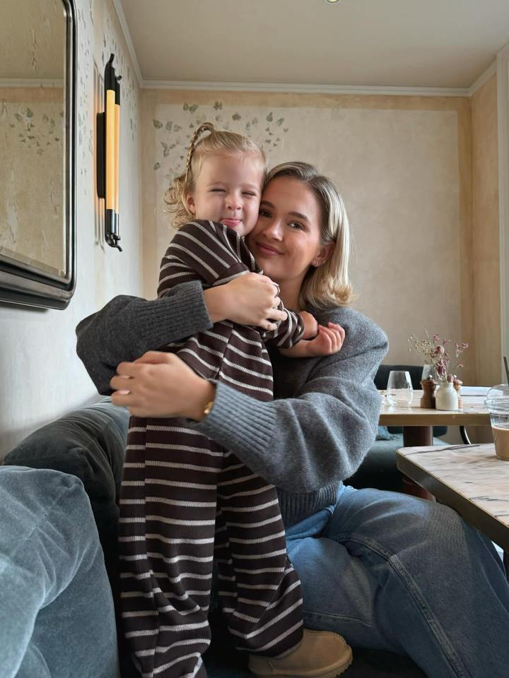 Molly-Mae and Bambi hugging, with Bambi making a funny face.