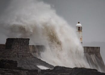 Brits brace for 70mph winds and half a month's rainfall in a single day as Met Office issues yellow warning
