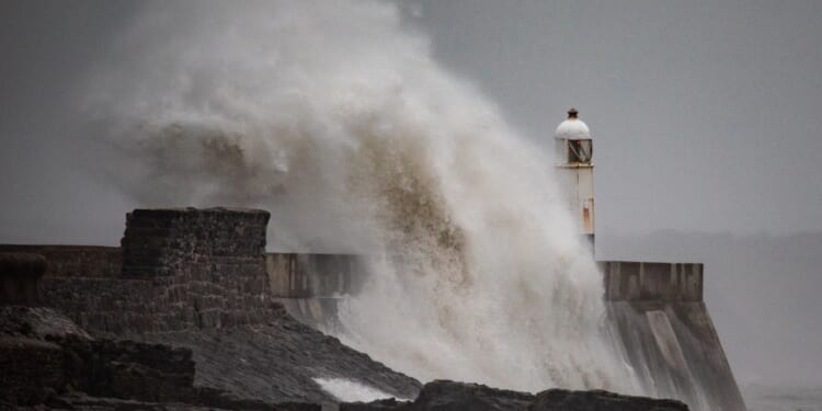 Brits brace for 70mph winds and half a month's rainfall in a single day as Met Office issues yellow warning