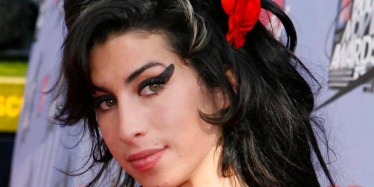 Amy Winehouse’s pals ‘concealed’ selling star's possessions for £730k at memorabilia auctions after death, dad claims