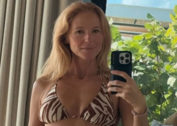 Jewel, 51, reveals fit figure in a zebra-print bikini on Barbuda beach getaway