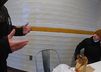 Watch moment cops confront CEO 'assassin' in McDonalds as new footage reveals seconds before Luigi Mangione was snared