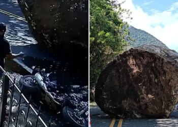 Terrifying moment locals run for their lives as giant boulder rolls down road & crushes motorbike after falling off hill