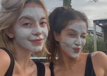 Euphoria star Sydney Sweeney poses in revealing swimwear with facemask in hot tub alongside friend while on UK trip