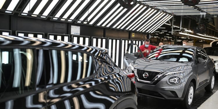 Britain will press ahead with banning new petrol and diesel cars despite Europe set to ditch its own plans