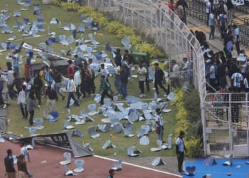 Lionel Messi turns up to unveil 70ft statue of himself in India... but raging fans go wild hurling bottles & chairs