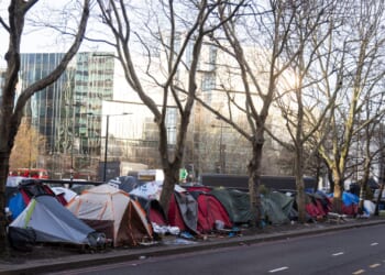 Welcome to UK's 'Skid Row' tent village where 'forgotten' residents fear for their lives in shadow of plush mansions