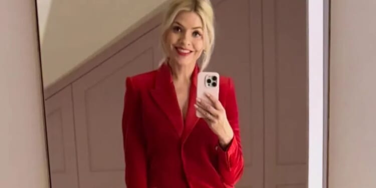 Holly Willoughby wears festive red suit for Christmas night out after court action for knocking rider off his scooter