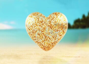 Love Island star reveals she's engaged as she shows off huge diamond engagement ring after romantic Dubai proposal