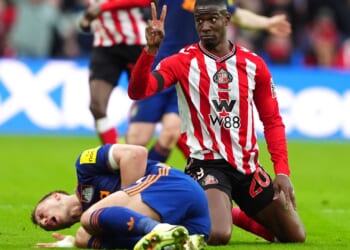 Newcastle star Dan Burn 'rushed to hospital with breathing difficulties' after going off with rib injury at Sunderland