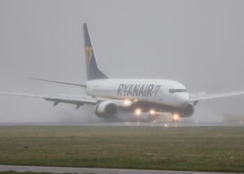 Chaos at major UK airport as dozens of flights DELAYED in heavy rain sparking chaos for pre-Xmas travellers