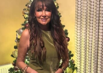 The Traitors legend shows off incredible weight loss after £7.5k facelift as she poses in figure hugging dress