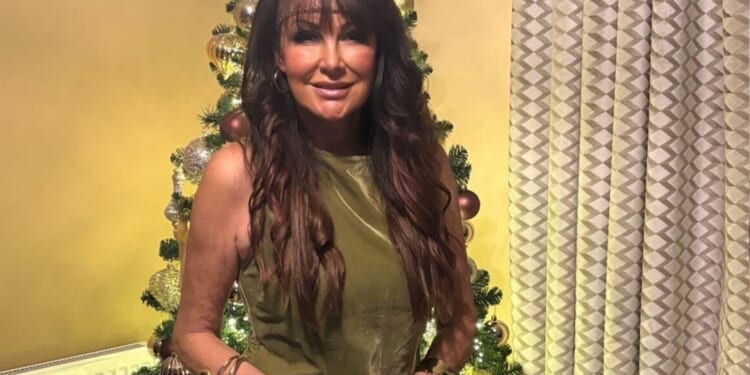 The Traitors legend shows off incredible weight loss after £7.5k facelift as she poses in figure hugging dress