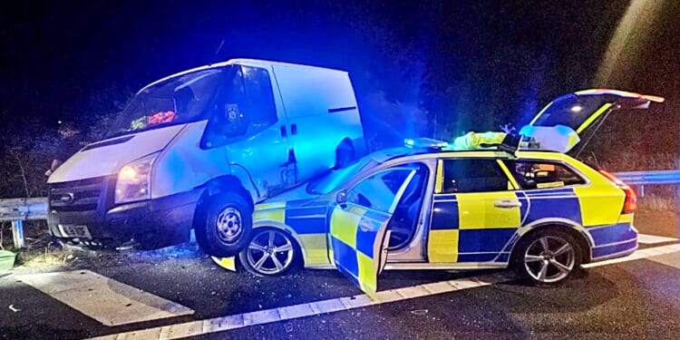 Tearaway driver rammed by desperate police in last ditch effort to stop him joining motorway the wrong way