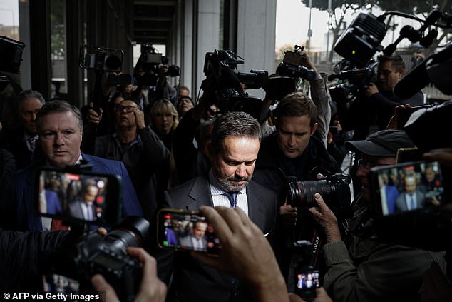 Defense attorney Alan Jackson arrives outside Los Angeles Superior Court where Nick Reiner, son of the late film director Rob Reiner, is expected to be arraigned on double murder charges, on December 17, 2025 in Los Angeles, California. The son of famed Hollywood director Rob Reiner was charged with two counts of first-degree murder over the brutal slaying of his parents, the chief prosecutor of Los Angeles said on December 16. (Photo by Caroline BREHMAN / AFP via Getty Images)