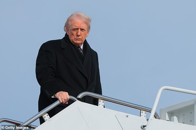 President Donald Trump boards Air Force One en route to Delaware on Wednesday in Joint Base Andrews, Maryland