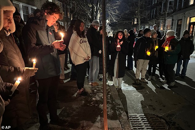 Loureiro's neighbors remembered him as a kind-hearted, 'wonderful man', while students flocked to a candle-lit vigil in his memory on Tuesday night, as shown above