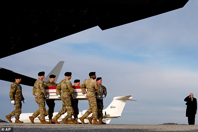 Trump salutes as the bodies were returned to their families at Dover Air Force Base in Delaware on Wednesday, December 17, 2025