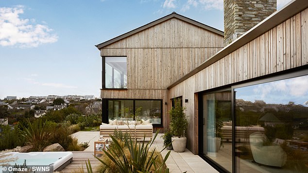 At the time of her big win Rose said the new house 'is absolutely gorgeous' and she will 'never get bored of walking onto the balcony and taking in these stunning views'