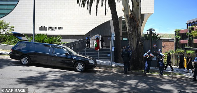 A large police presence is seen  at the funeral service for Tibor Weitzen at Chabad of Bondi in Sydney, Thursday, December 18, 2025. Australia is in mourning after gunmen opened fire on Bondi Beach, killing 15 people in an attack designed to target the Jewish community. (AAP Image/Dean Lewins) NO ARCHIVING