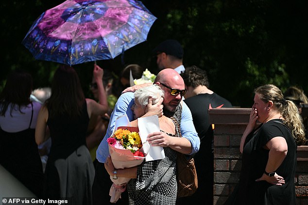 Friends and family could be seen hugging ahead of Matilda's funeral