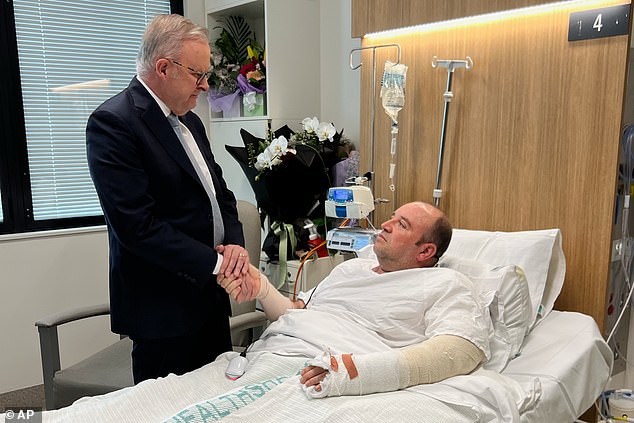 Anthony Albanese (left) visited Ahmed al-Ahmed (right) at St George Hospital on Tuesday