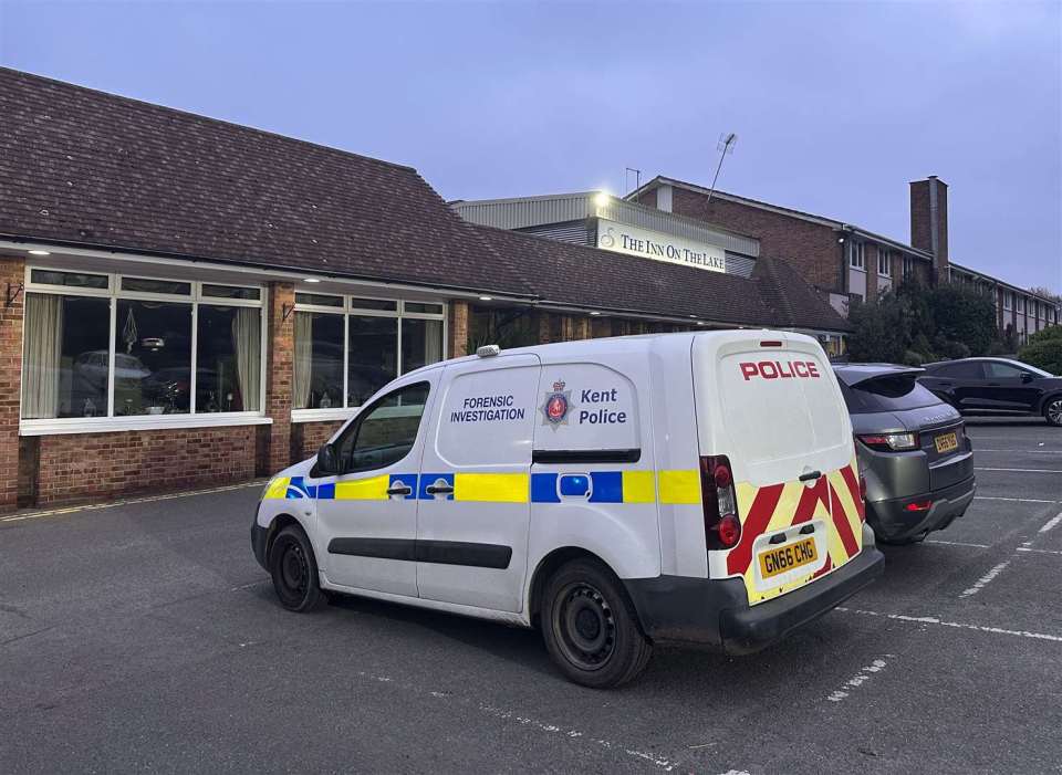A Kent Police forensic investigation van parked in front of The Inn on the Lake hotel.