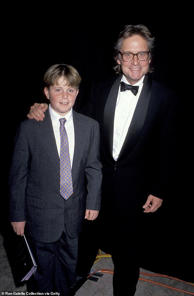 The son of award-winning Michael Douglas was caught up in the midst of a bad crowd of friends when he turned to drugs aged 13 (pictured with his father)