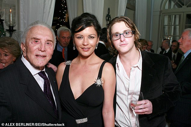 Cameron once blamed genetics while addicted and said he thought he'd 'take it as far as I could' smoking pot at 13, coke at 15, meth at 17, and heroin by 26 (Cameron pictured with his step mum Catherine Zeta-Jones and grandfather Kirk)