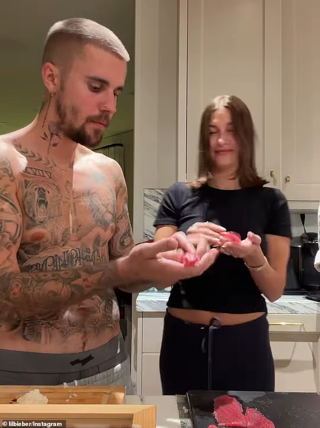 The couple appeared to be enjoying the cooking lesson from the comfort of their own home