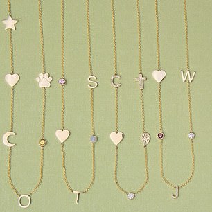 Available in yellow gold, rose gold or white gold, the necklaces can be personalised with letters, charms and birthstones, making each piece unique