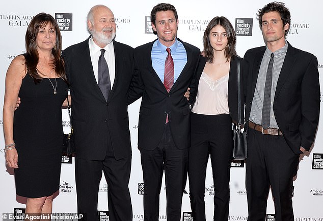 The Reiners, who married in 1989, had three children together - (from left) Jake, 34, Nick, 32, and Romy, 27; they are all pictured in 2014 at Avery Fisher Hall in New York