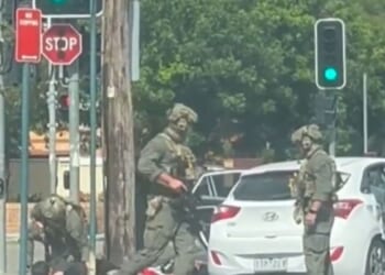 Heavily armed cops ram car in Sydney ‘and arrest five’ with city on edge in wake of Bondi terror attack